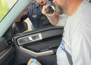 Texas community welcomes return of officer who was shot multiple times in gunfight