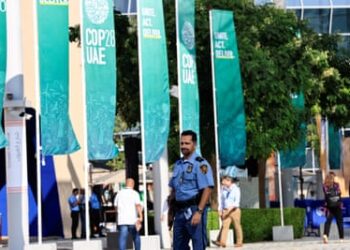 A UN security officer on patrol during Cop28 in Dubai.