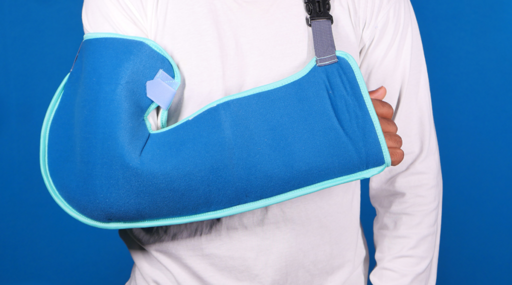 A person wearing a blue arm sleeve.
