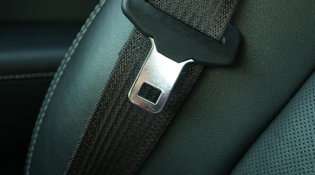 A seat belt in a car.