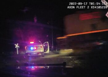 Former Colo. officer pleads guilty to parking cruiser on railroad tracks after detainee severely injured