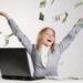 businesswoman lawyer associate raining bonus money hands in air