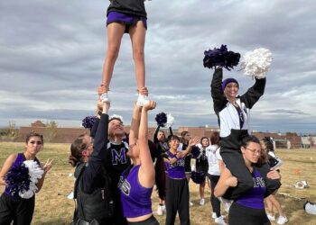 “They see me as a person”: Albuquerque school resource officer and cheer coach bridges gap, inspires students