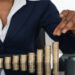 Woman stacking coins