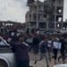 Chaotic scenes during aid distribution in Gaza City as residents flee gunfire – video