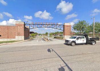 The entrance to the high school is pictured.