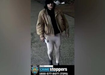 Raad Almansoori who police say is wearing Denisse Oleas-Arancibia's leggings after she was killed