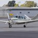 File:Beech V35 Bonanza (VH-DEV) taxiing at Wagga Wagga Airport.jpg