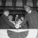 New York mayor shakes hand with first black police officer
