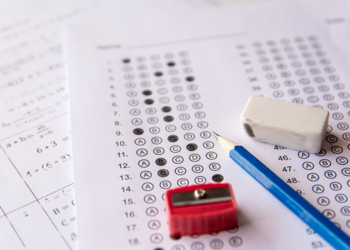 Standardized test with pencil, sharpener and eraser