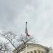 cloudy sky, flag, and supreme court