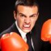 Aggressive businessman with boxing gloves