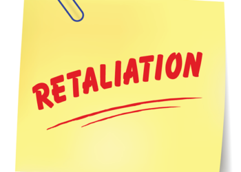 Post-it note with the word retaliation written on it