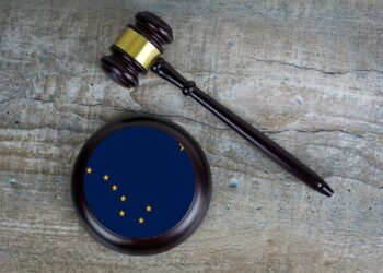 shutterstock_alaska flag and gavel