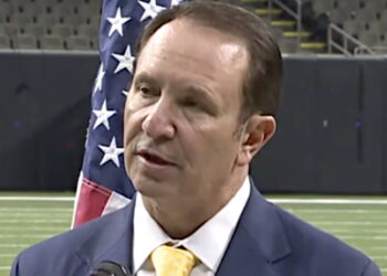 Governor Urges New University National Anthem Policy to Strip Athletes' Scholarships