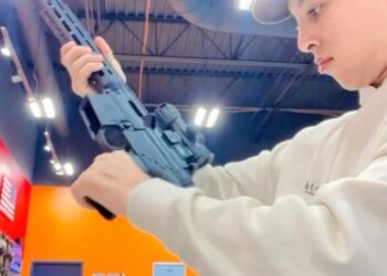 Leonel Moreno holding a firearm